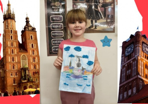 Anastazja prezentuje wykonaną pracę "Pomnik Syreny nad Wisłą""