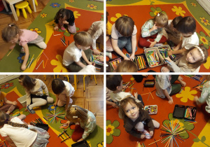 dzieci układają z kredek ołówkowych miasto