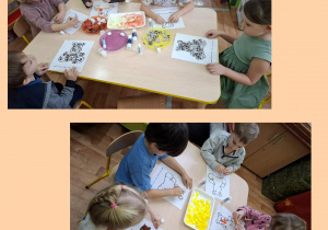 dzieci wykonują misiowe prace plastyczne