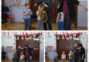 dzieci próbują grać na podanym przez pana