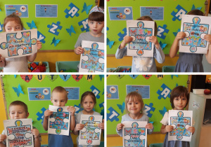 dzieci z pokolorowanymi puzzlami o autyzmie